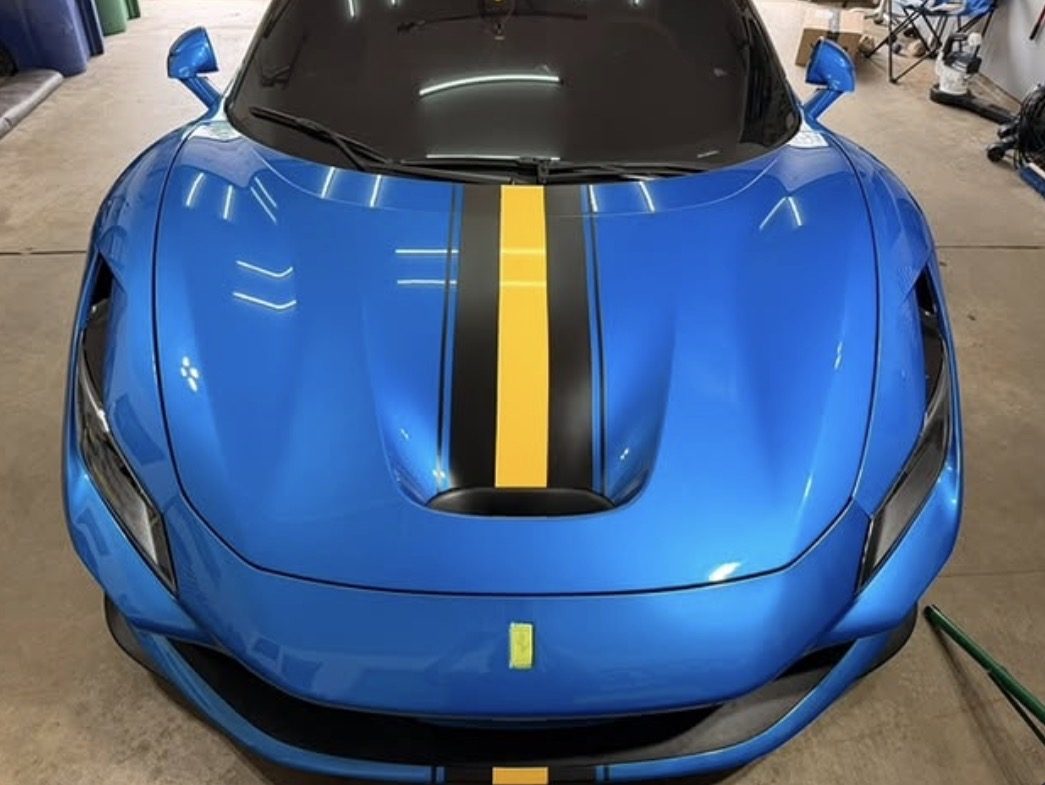 Deep blue Ferrari 812 with mirror gloss paintwork after a professional ceramic coating in Austin